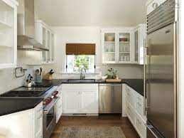 If you plan to feature a backsplash or other wall design, consider arranging the tiles in opposition to the floorboards' orientation—this will help to create the illusion of depth in solve your small kitchen quandaries with an efficient galley kitchen floor plan. 10 10 U Shaped Kitchen Designs Kitchen Layout U Shaped Small Kitchen Layouts Kitchen Remodel Cost