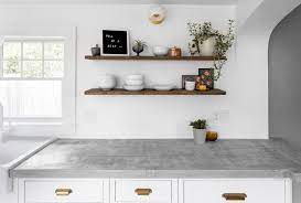 Concrete gray quartz countertop material is the ideal solution for those looking to create that modern industrial look. Open Wood Kitchen Shelving Concrete Countertops White Inset Cabinets Galley Kitchen Kitchen Design Gallery Concrete Countertops White Grey Countertops