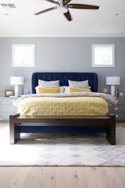Arcadia Residence Transitional Bedroom With Stunning Royal Blue Upholstered Bed Neutral Gray Wal Blue And Gold Bedroom Blue Bedroom Decor Blue Yellow Bedrooms