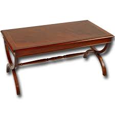 Basic oak or blonde wood tables can be had, as well as more elaborate tables that include brass scrollwork, artistic iron bases, and retro/modern design elements. Reproduction Roman Coffee Table In Yew Burr Walnut And Mahogany