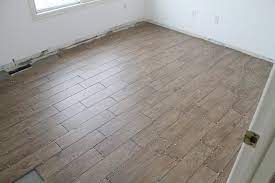 Aug 22, 2019 · paying tribute to beautiful hardwood flooring, faux wood tile is a ceramic or porcelain tile that combines the rich, textured finishes and warmth of real wood with the durability, functionality and design flexibility of tile. Tips For Achieving Realistic Faux Wood Tile Chris Loves Julia