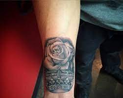Rose tattoo meanings world over the red rose is known to be a symbol of love and has been largely used in expressing such themes as passion, romance and sexuality. The Rose And Crown Tattoo Meaning What Does It Mean