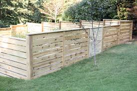 A horizontal board fence is a good option when the property sits on a slope and the fence has to be terraced. How To Build A Fence Part 2 Bower Power