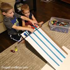 Visit this site for details: How To Make A Cardboard Box Race Track For Hot Wheels Cars Frugal Fun For Boys And Girls