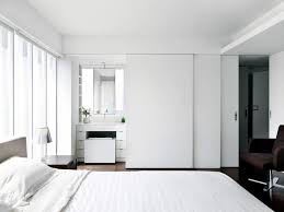 How important is bathroom door to you? Bedroom With Bathroom Behind The Sliding Doors Interior Design Ideas Ofdesign