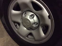 You don't have to take all 4 wheels of your car to pop out the center caps. How Do You Remove Center Cap Factory Steel Wheels Tacoma World