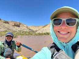 Stef Poirier at the oars of my dory Susie Too (another Replica dory), March  2014. Cecelia Mortenson in the passenger seat. The original hull was built  at the request of Martin Litton