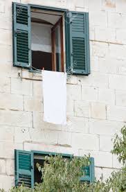 White shutters on brick house zoeyremodeling. Beautiful Old House From A White Brick Open Window With Green Stock Photo Picture And Royalty Free Image Image 73490030