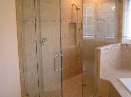 The shower space uses two different types of tile, the small format for the flooring, and the large format for the rest of the space. Small Bathroom Shower Stall Ideas Design Corral