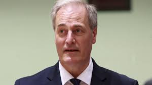 Lord Bates quits British government for being late