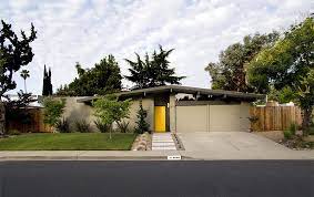 This color can easily stand out against most colors and shapes. The House With The Yellow Door Mid Century Modern House Eichler Exterior Modern Landscaping