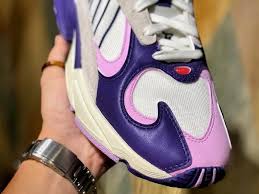 The popular retro running silhouette from adidas features a white mesh and felt upper with dark. A Closer Look At The Dragon Ball Z X Adidas Frieza Yung 1 Sneaker Freaker