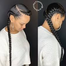 5 Ways To Wear The Two Braid Cornrow Style Everyone S Rocking Un Ruly Cornrow Hairstyles Feed In Braids Hairstyles Two Braid Hairstyles