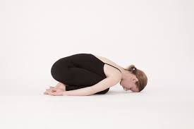 Matsyasana twist or seated twist. Top 6 Yoga Poses To Ease Constipation