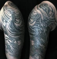 The gorgeous phoenix tattoos are created in different colors and positions to fit the wearer's needs. 60 Phoenix Tattoo Designs For Men A 1 400 Year Old Bird