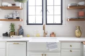 The mayan aged brass faucet is £295 ($459.86). Brass Gooseneck Faucet And Farmhouse Sink Under Black Kitchen Casement Windows Transitional Kitchen Benjamin Moore White Dove
