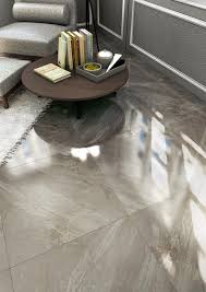 Maybe you would like to learn more about one of these? Polished Porcelain Stone Or Slate Like Kitchen Foyer Tiles Olympia Tile Taupe Must Collection Tile Floor Living Room Ceramic Floor Tile Living Room Tiles