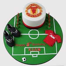 The making of a manchester united cake. Online Manchester United Theme Truffle Cake Gift Delivery In Singapore Ferns N Petals