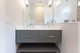 A sink and cabinet underneath are generally considered as mandatory part of every artistic floating bathroom vanity draped extensively in light grain wood. Modern Floating Vanity In Elmhurst Illinois Wheatland Custom Cabinetry Woodwork