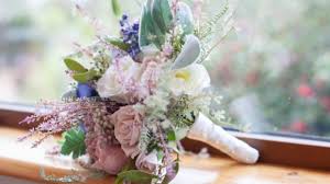 This artificial wisteria long hanging flower bush is not only perfect as a wedding bouquet but also for your tall wall decoration in your wedding restaurant. Should You Use Artificial Flowers For Your Wedding Weddingsonline
