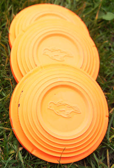 1000 Orange clay targetsClay pigeon traps, Gun cabinets