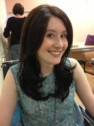 Carly looks attractive in dark hair