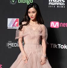 In 2013, she was chosen by southern metrop. Angelababy Wears Dior Couture At Mnet Asian Music Awards In Hong Kong Vogue