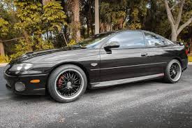 Image result for Dark Otter Gray 2004 Pontiac