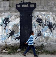 This opens in a new window. Banksy In Palestine A Look At The Street Artist S Work In Gaza And The West Bank The National