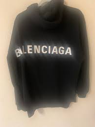 Shop balenciaga hoodies for women at farfetch and find oversized styles and reworked logos that have become synonymous with the french fashion riffing on everything from the pop cultural to the political, the edit of balenciaga hoodies features witty motifs and reworked logos that have become. Men S Back Logo Hoodie From Balenciaga Grailed
