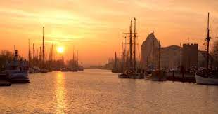 panoramio photo of greifswald sonnenaufgang am museumshafen good morning world baltic sea places