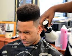 West Genesee&#39;s Mike Henry gets his High Top Fade. West Genesee&#39;s Mike Henry gets his High Top Fade - 12188455-standard