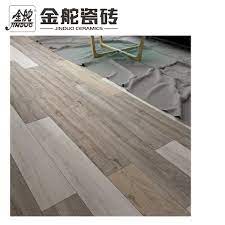 Water will damage the laminate if allowed to seep down between the joints. China Foshan Jinduo Ceramics Tile Factory Lowest Wood Look Like Ceramic Tiles China Wall Tile Porcelain Tile