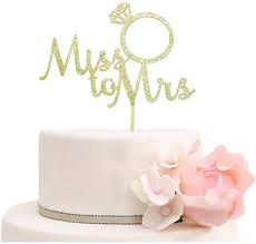 Engagement cakes with an attractive cakes and toping design will be unforgettable for couples. Amazon Com Miss To Mrs With Diamond Ring Cake Topper For Bridal Shower Wedding Engagement Party Decorations Gold Glitter Toys Games