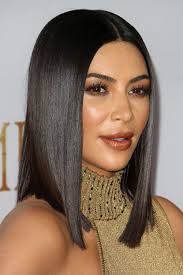 The keeping up with the kardashians sister mashed a vitamin with her shampoo to chage the. Kim Kardashian S Hairstyles Hair Colors Steal Her Style
