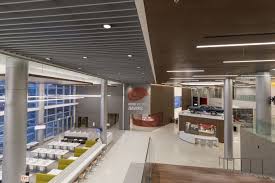 Terrazzothursdays Featuring Malcolm X College This 110 000 Sq Ft Grey White Terrazzo Floor Installation Terrazzo Terrazzo Flooring Floor Installation