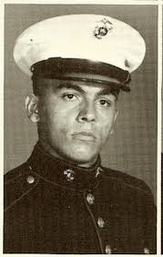 Visiting a local marine memorial or grave