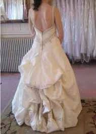 Ah The Wedding Gown One Of The Most Expensive Beautiful And Criticized Pieces Of Finery We L Wedding Dress Bustle Organza Wedding Gowns Wedding Gown Bustle