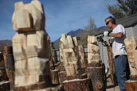 Finger lenght looks fine to me as it is right now, you may cut the wire haha.well.i mean it! Cutting Edge Art Brought To Bear Via Chainsaws For Doney Park Business Local Azdailysun Com