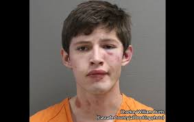 Ouzts charged with breaking into an apartment and assaulting a man using  keys