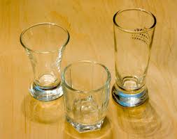 This depends on which part of the world you are in but the standard conversion value is lifted from the us metric system which is 29.57 ml is to one fluid ounce, according to the calculator site. Shot Glass Wikipedia