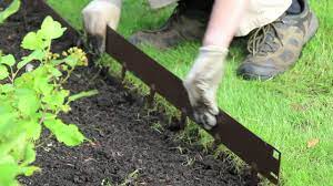 If the edge will be curved, make sure you include the curves when laying out your reference lines. Everedge How To Install Everedge Lawn Landscape Edging Youtube
