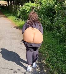 Short PAWG sister displaying her ample derriere in public