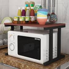 If the microwave is too low, moving dishes in and out of it can be a nuisance. Toaster Oven Shelf Decorative Journals