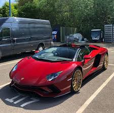 Lamborghini Aventador S Roadster Painted In Rosso Metis W A Set Of Gold Dianthus Wheels Photo Taken Sports Cars Luxury Lamborghini Aventador Lamborghini Cars
