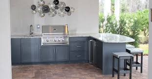 outdoor kitchen with bar seating