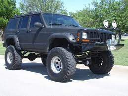Rhino Lined Jeep Xj I Want To Line The Lower Half Of Mine Jeep Xj Jeep Cherokee Xj Jeep Xj Mods