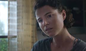 A woman's quiet seaside vacation takes an unsettling turn when her fixation on a young mother staying at a nearby villa . The Lost Daughter Ending Explained What Happens To Leda