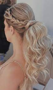 For this particular look, the loose waves of braided locks lead into the lower ponytail, before wrapping around its base. These Ponytail Hairstyles Will Take Your Hairstyle To The Next Level