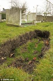 now sinkholes hit graves! cemetery